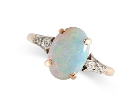 NO RESERVE - AN OPAL AND DIAMOND DRESS RING Made in yellow gold and platinum Oval cabochon opal, weighing approximately 1.50 