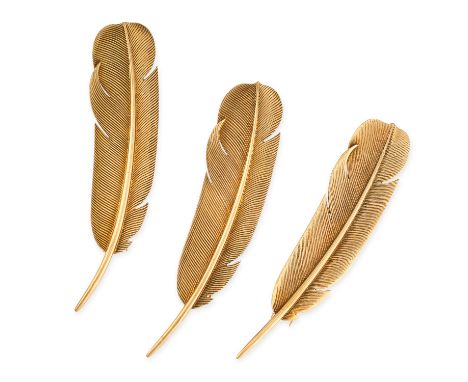NO RESERVE - HERMES, THREE VINTAGE GOLD FEATHER BROOCHES Made in 18 carat yellow gold, designed as feathers with trompe l'oei
