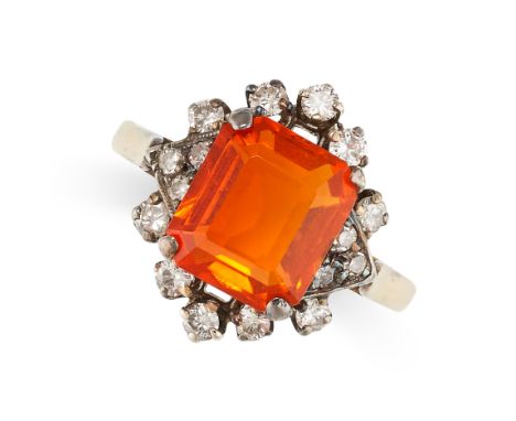 NO RESERVE - A FIRE OPAL AND DIAMOND DRESS RING Made in yellow gold Octagonal step cut fire opal, weighing approximately 1.59