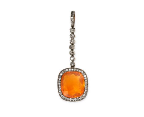 NO RESERVE - AN ANTIQUE FIRE OPAL AND DIAMOND PENDANT Made in yellow gold and silver Cushion cut fire opal, weighing approxim