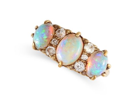 NO RESERVE - AN ANTIQUE OPAL AND DIAMOND DRESS RING Made in yellow gold Three graduated oval cabochon opals Old European bril