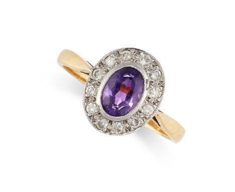 NO RESERVE - AN AMETHYST AND DIAMOND CLUSTER RING Made in 18 carat yellow gold Oval cut amethyst Round brilliant cut diamonds