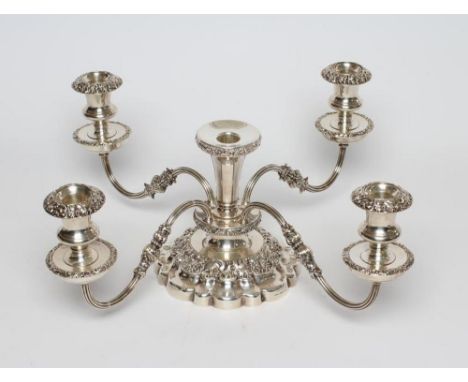 A PLATED ON COPPER METAMORPHIC TABLE CENTREPIECE/CANDELABRUM, the lobed circular base (6 1/2" diameter) issuing with four bra