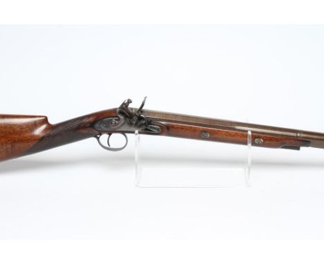A FLINTLOCK SPORTING GUN by Fisher of London, the 32" barrel octagonal at the breech, gold inlaid with maker's name, front si