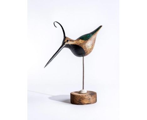 GUY TAPLIN (b.1939), "Lapwing", a carved model with green, black and white markings and curved metal crest, signed, titled an