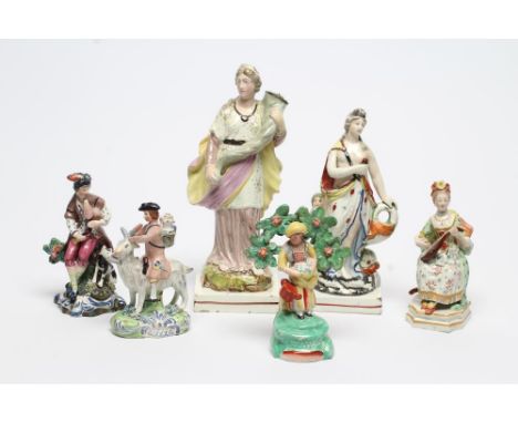 SIX VARIOUS ENGLISH EARTHENWARE FIGURES, late 18th century and later, comprising a pearlware Cybele holding a cornucopia, 10 
