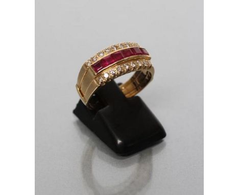 A RUBY AND DIAMOND HALF HOOP RING, the six square cut rubies channel set to small round brilliant cut diamond borders and a t