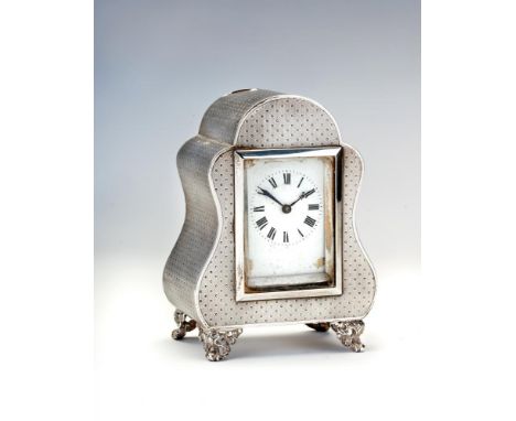 A LATE VICTORIAN SILVER MANTEL TIMEPIECE, maker William Comyns, London 1901, the oblong white enamel dial with black Roman nu