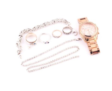 A collection of jewelleryCompirisng of a stainless steel wristwatch by Michael Kors, a silver bracelet and necklace, both sta