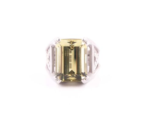 A beryl and diamond ring by Barry Kieselstein CordThe large cut-cornered step-cut beryl, measuring approximately 15.9mm x 12m