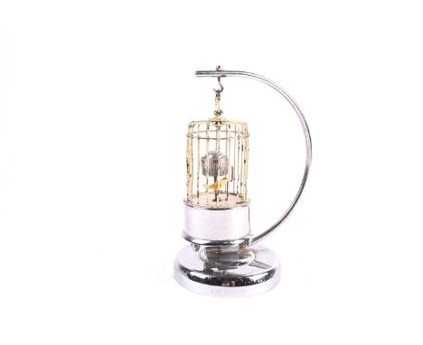 A mid-20th century automaton clock, a bird in a cage on a chrome stand, 19.5 cm high.