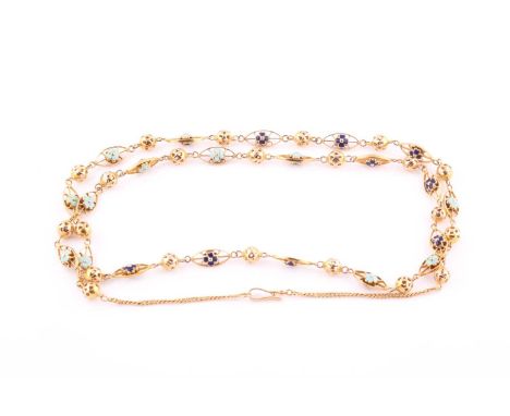 An enamel long chain necklaceComposed of alternating pierced balls and pierced lozenge-shaped links, each decorated with blue
