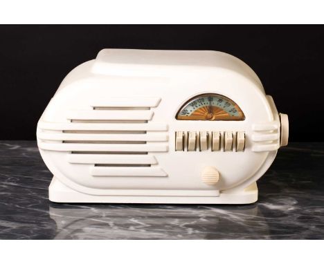 A vintage Belmont 'The Rabbit' bakelite radio, model 6D111, circa 1946, with two tone engine turned dial, in a cream ivory ba