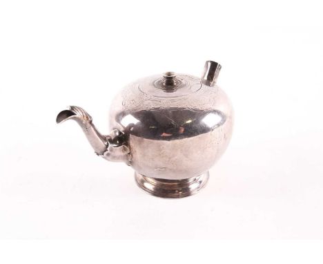 An early Georgian teapot, Newcastle (possibly 1722) by James Kirkup, of bullet form on a circular foot (lacking handle and li