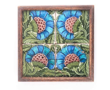A set of four William de Morgan BBB 6" tiles, late 19th century, contained in an oak frame (one tile cracked), 33.5 cm x 34 c