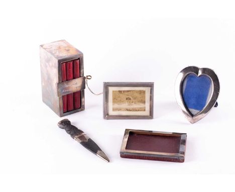 An Edwardian silver housekeeper's box, London 1907 by the Goldsmiths and Silversmiths Ltd, with lockable cover, the interior 