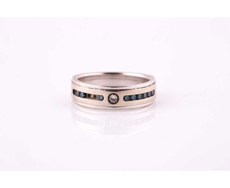 A diamond and blue diamond ringThe 14ct white gold band collet-set to the front with a brilliant-cut diamond, between rows of