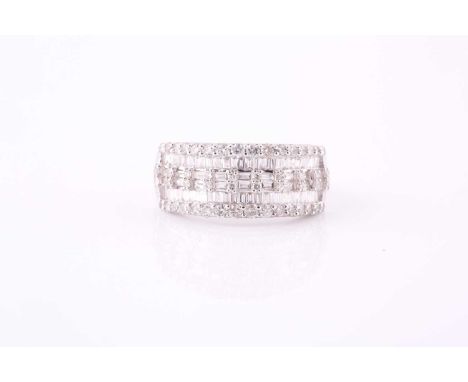 A diamond dress ringSet to the front with rows of baguette and brilliant-cut diamonds, approximately 1.95cts total, stamped 9