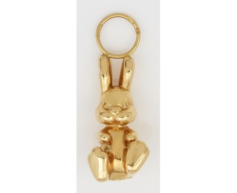 HasenanhängerGelbgold, gest. 750. Sitzender Hase als Anhänger. Gew. ca. 1,49 g. A bunny shaped pendant, in 18 k gold.