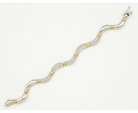 Modernes Brillant-ArmbandWeiß- und Gelbgold, gest. 750. Schauseitig besetzt mit Brillanten in Pavéfassung von zus. ca. 2,30 c