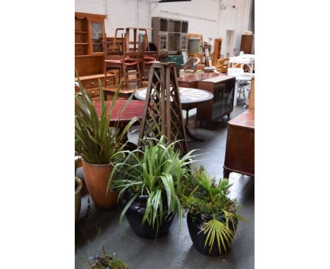Two large ceramic planters, a Terra Coota planter and an obelisk trellis