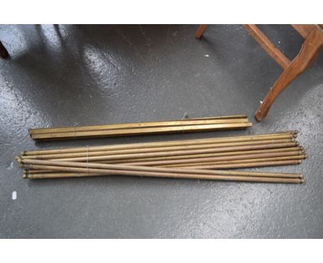 Heavy brass stair rods with ball finial and iron core, 94cm L (16) together with brass stair rods of trinagular section, 75cm