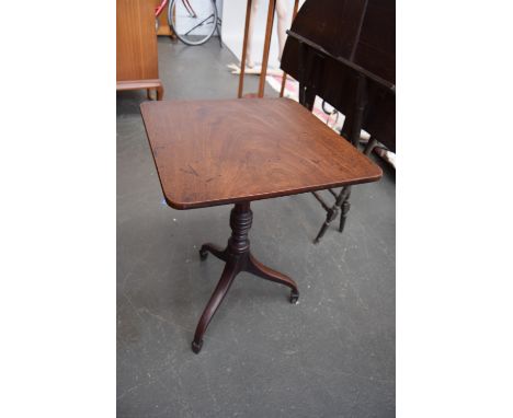 A Regency mahogany tripod table, square top on a ring turned triform base 