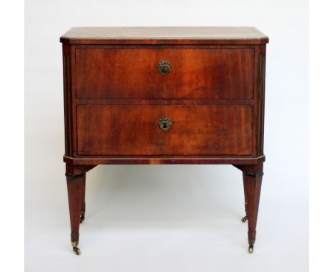 A 19th century German fruitwood petit commode, with two long drawers on square tapered legs with applied gilt metal mounts, 7