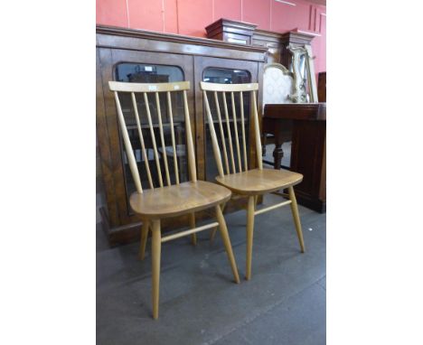 A pair of Ercol Blonde elm and beech chairs 