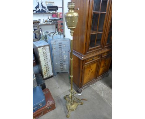 A Victorian brass telescopic floor standing lamp 