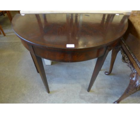 An Edward VII inlaid mahogany demi-lune card table 