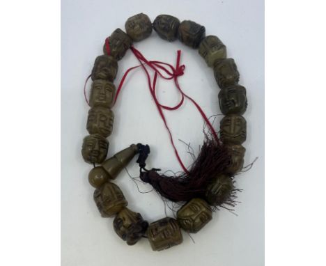 A Chinese carved jade prayer's beads