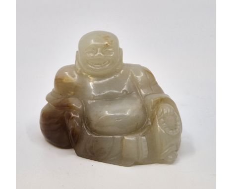 A Chinese carved jade figure of Buddha, height 5cm.  Further images added.