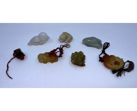 A collection of seven Chinese small carved jade figures, L:6cm (7)