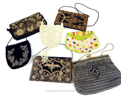  A collection of vintage ladies evening bags, to include three early 20th century bead work examples, three Indian black velv