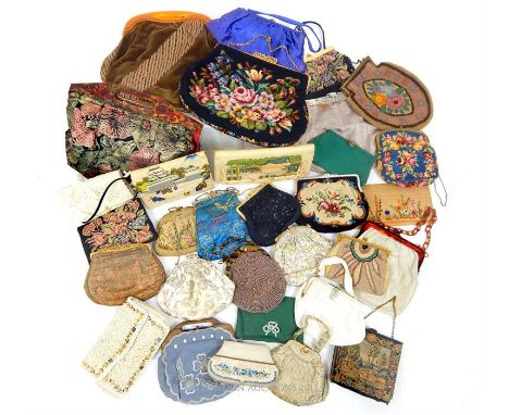  A large collection of vintage ladies evening and handbags, to include some with celluloid frames, petit point examples , a c