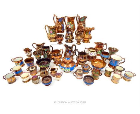 A collection of mid 19th century copper lustre pottery, to include jugs of varying size, a teapot, mustard pots and covers, p