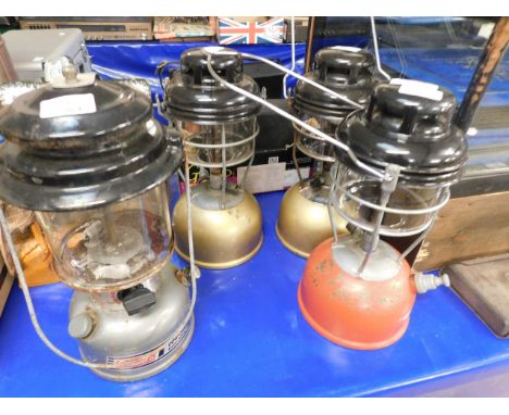 FOUR VINTAGE TILLEY LAMPS    