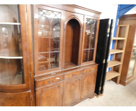 REPRODUCTION MAHOGANY LIVING ROOM CABINET WITH CENTRAL ARCHED OPEN SHELF FLANKED EITHER SIDE BY GLAZED DOORS, THE BASE WITH T