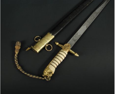 An 1891 pattern midshipman's Dirk, the 45.5cm blade by Wilkinsword Sword Co Ltd, the etched blade with Crowned GRVI, gilt hil