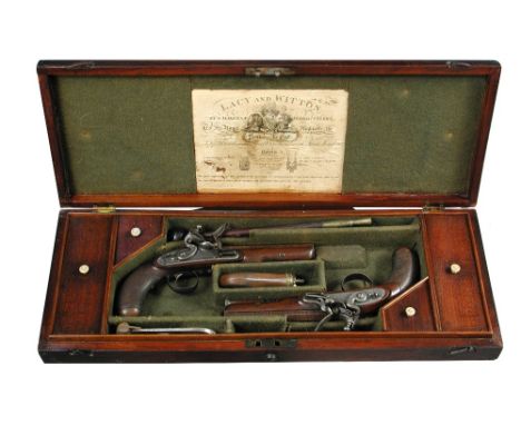 A cased pair of early 19th century flintlock overcoat pistols by Lacy and Witton, London, early 19th century with browned Dam