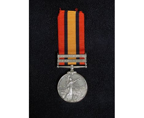 A Queen's South Africa medal to TPR R. B. Scott S: RHOD: VOLS. with 2 clasps for Rhodesia and Relief of Mafeking  