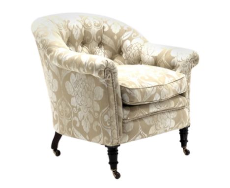 19th century tub chair with curved buttoned back, upholstered in champagne scrolled and flur de lys pattern, loose seat cushi