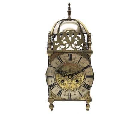 Late Victorian brass Lantern clock with chromed bell, pierced frets, urn finials and silvered Roman dial, the twin train move