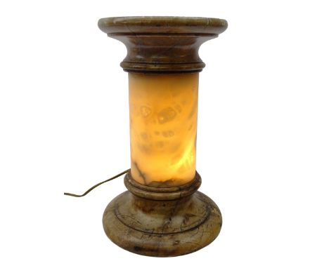 Carved alabaster illuminated pedestal, circular top on cylindrical column with integral light, H42cm  Condition Report Click 