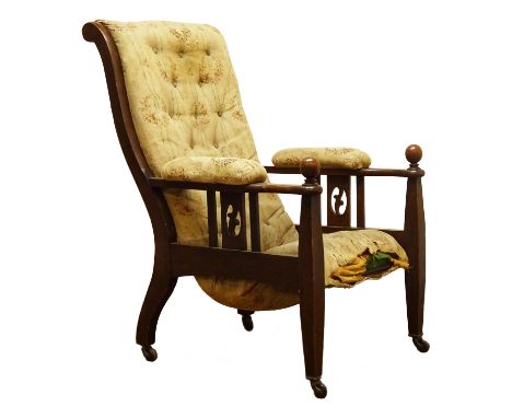 Arts & Crafts oak armchair, upholstered back, seat and arm pads, pierced and railed side panels, the square tapering supports