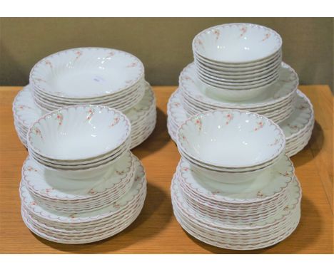 A vintage collection of Wedgwood Pink Garland dinner service, including dinner plates, bowls and more