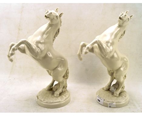 A pair of German Hutschenreuther white glazed ceramic horses, marked K. Tutter 8193, height 31.5cm