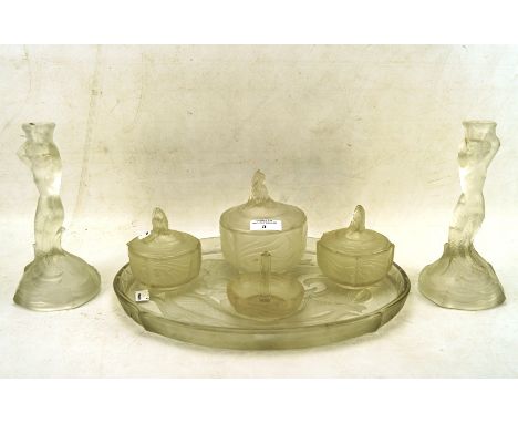 An Art Deco colourless glass matched six piece dressing table set decorated with mermaids and fish in the Lalique style, incl