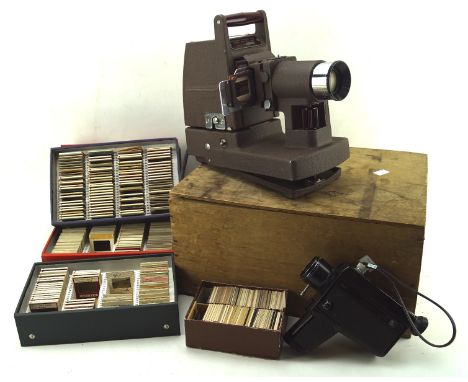 A collection of vintage cameras, mostly 1950's, including a Halina, together with photographic slides,
